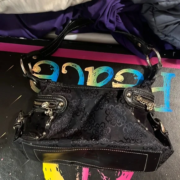 Kathy Van Zeeland Black Handbag with Heart Zippers